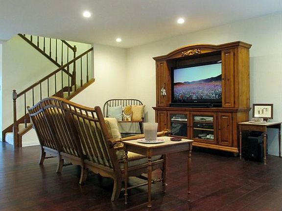Open living room/family room with newly installed floors.