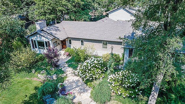 Stunning Home nestled in heart of Roselle. Meticulously landscaped. A private retreat a pleasure to call home.