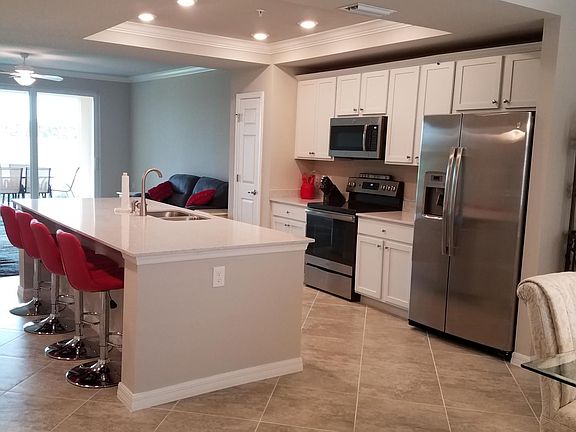 A kitchen you will enjoy cooking and entertaining in.