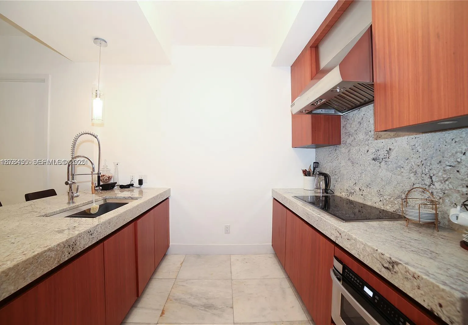 9705 Collins Ave — Photo 2
