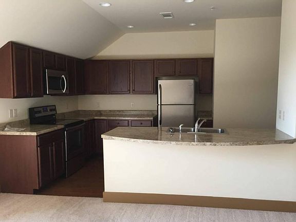 Living room looking into kitchen - open concept