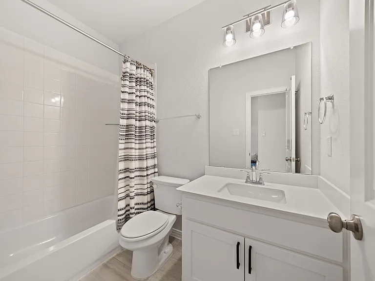 Shared bathroom between bedroom #1 & bedroom #2. Bathroom #1