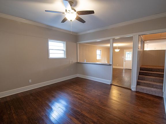 Den looking thru to Dining room and back door