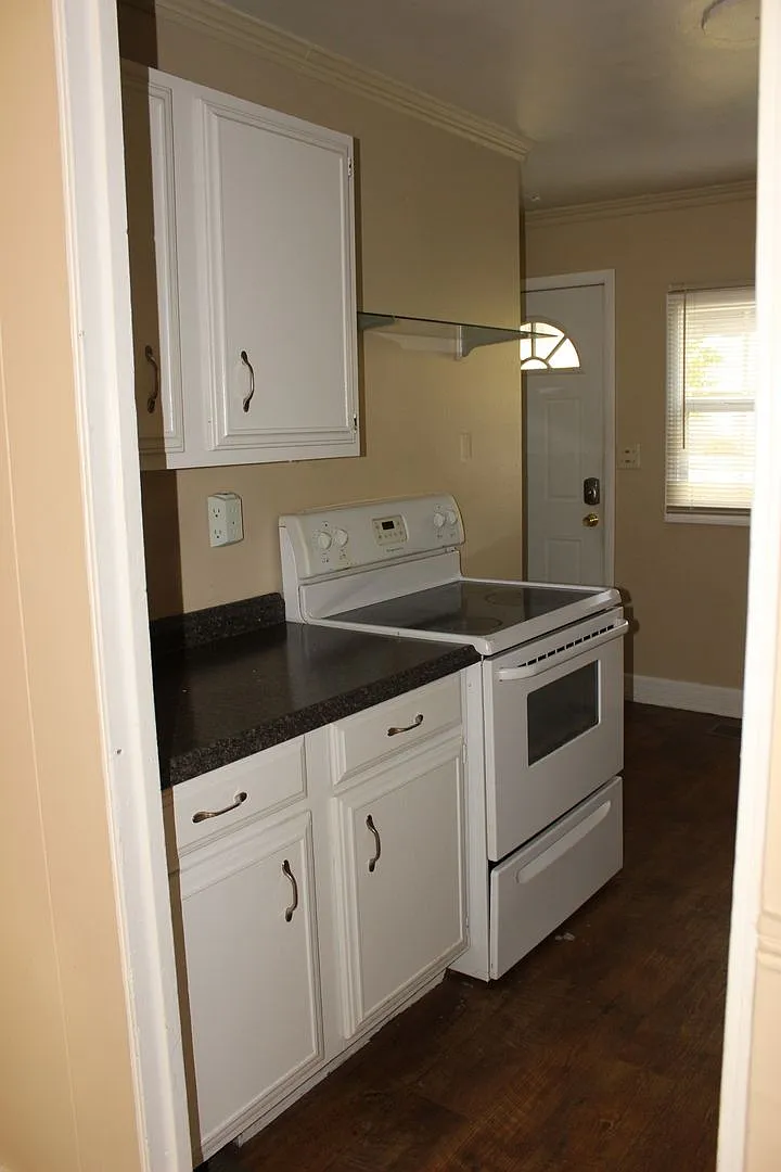 Walk to Ball State! Spacious 4BR with Fenced Yard & Garage — Photo 2