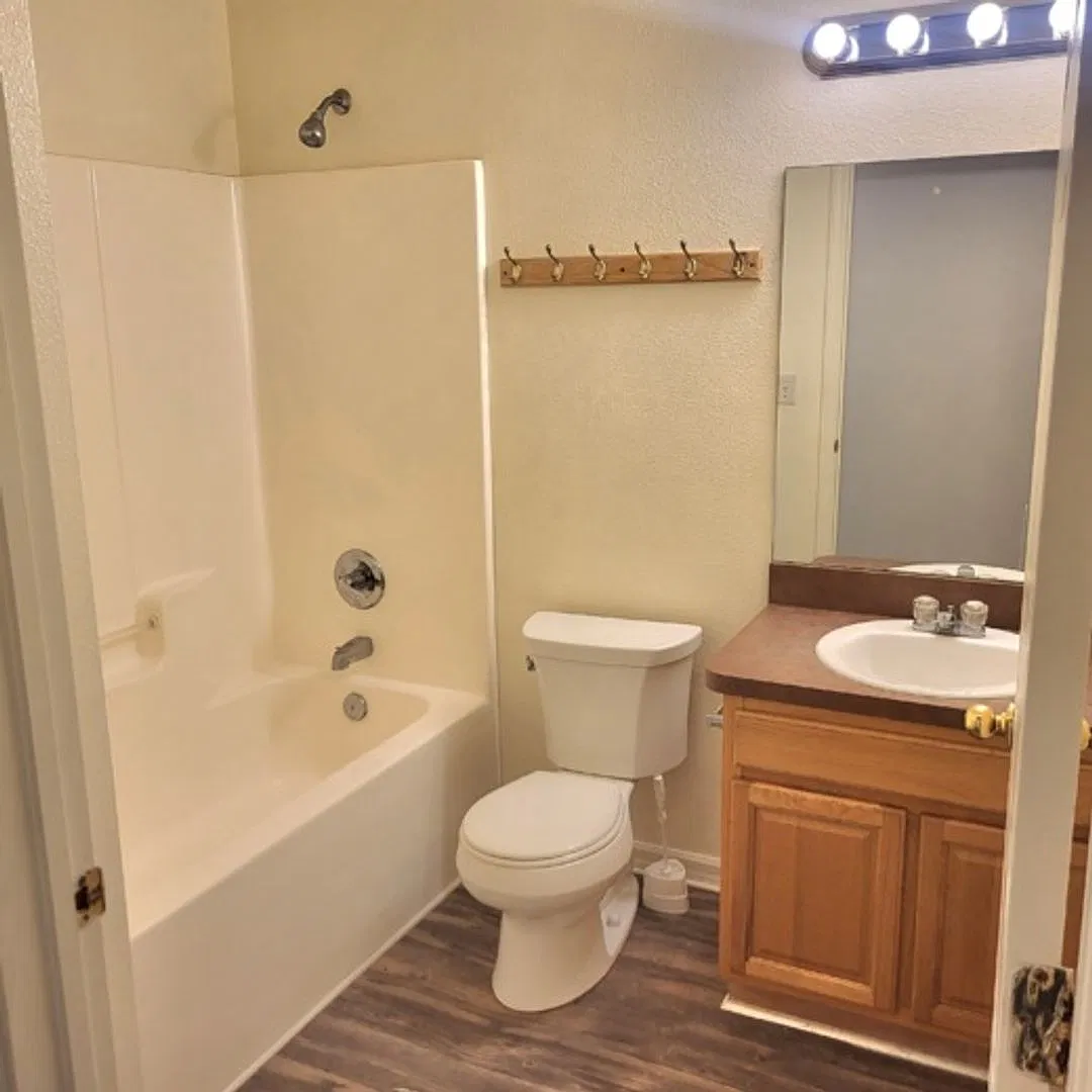 Well Laid Out 4 Bed/ 2 Baths with large Living/Dining and Vinyl Floors throughout on Partially Fe... — Photo 1