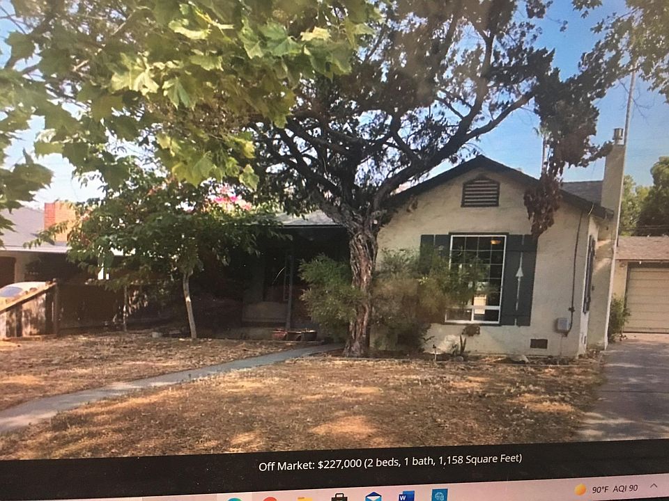 House has attached single garage and two outdoor storage spaces