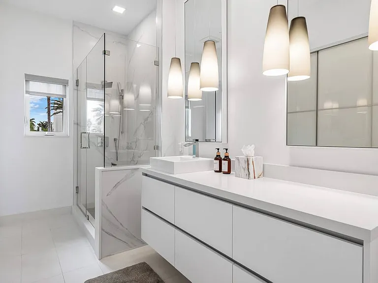 Modern bathroom with high-end finishes and spacious design for a spa-like experience.
