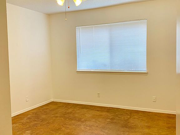 Both bedrooms fairly equal in size back bedroom has double closet one walking one bifold