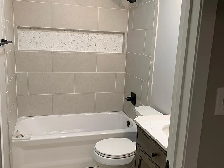 Bathroom with niche.