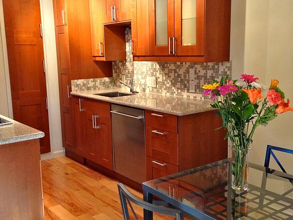 New kitchen with granite countertops, stainless appliances