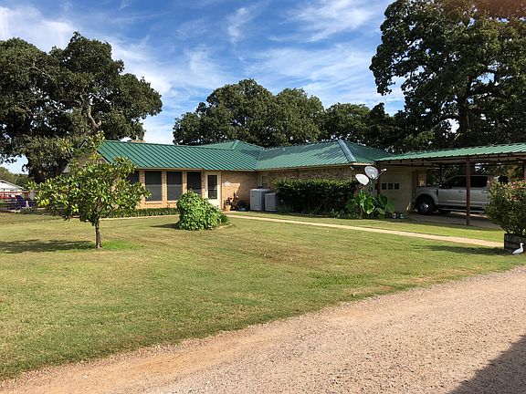 Side entrance & carport