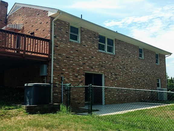 Fenced in backyard with concrete patio. Access to lower level.