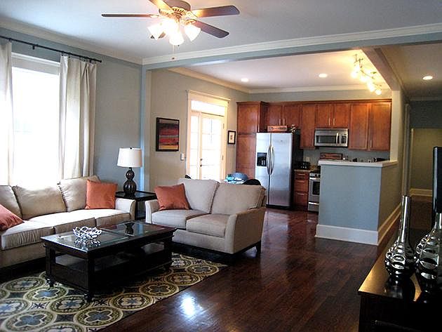 Open concept living, dining and kitchen areas