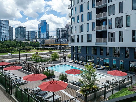 Resort style swimming pool with skyline views