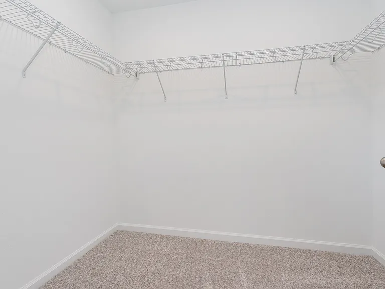 One of two closets in the master, this is the smaller one