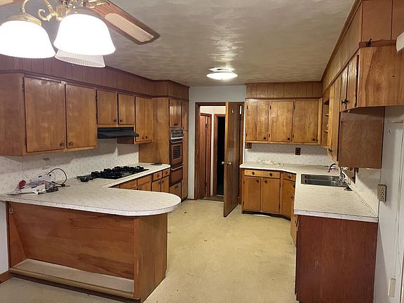 Kitchen. Door leads to garage and back door plus basement