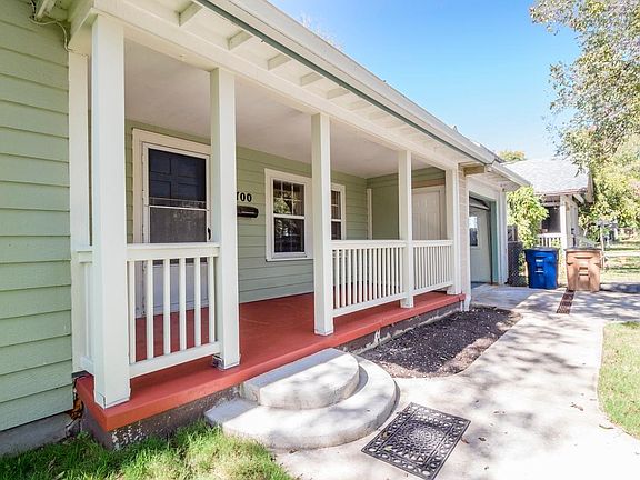 inviting front porch, 2 car tandem garage