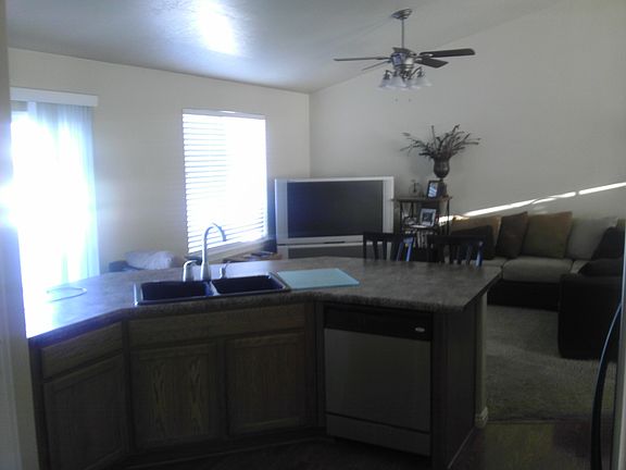View across kitchen counter into family room