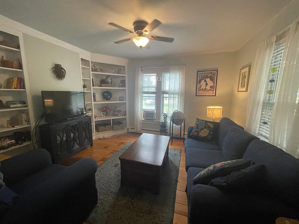 Living room with built in bookcases