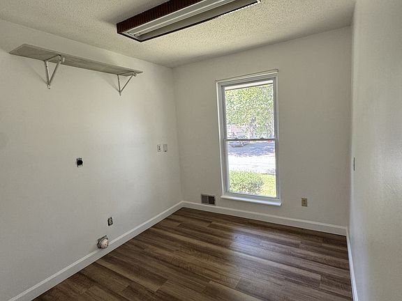 Additional room on the first floor to use as a laundry, pantry, office, or more.