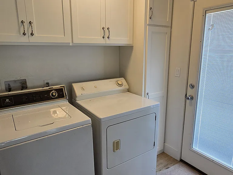 included Washer/Dryer off of kitchen area with exit/entry door to East side of house