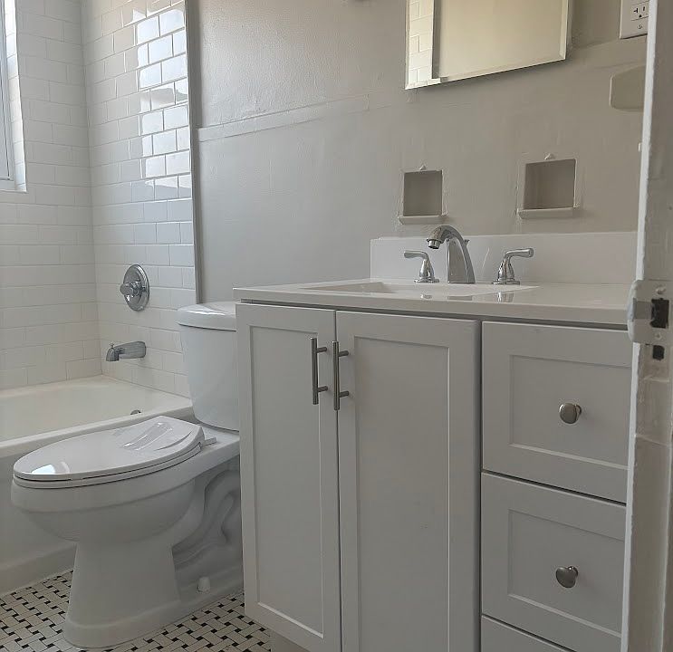 New Vanity, Vintage Tile, reglazed bathtub.