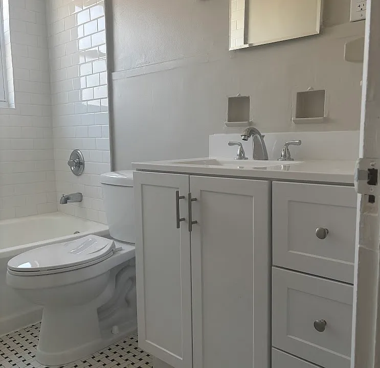 New Vanity, Vintage Tile, reglazed bathtub.