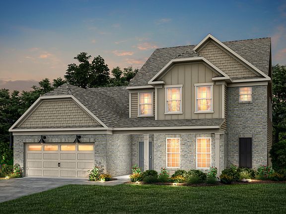 Furman Exterior 58 features brick, siding, shakes, covered front siting porch and 2 car garage