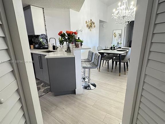 5th image of 8801 Wiles Rd APT 308