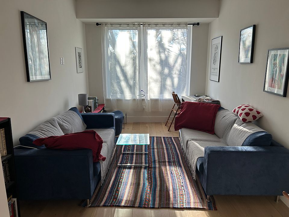 Living/dining area is drenched in light.