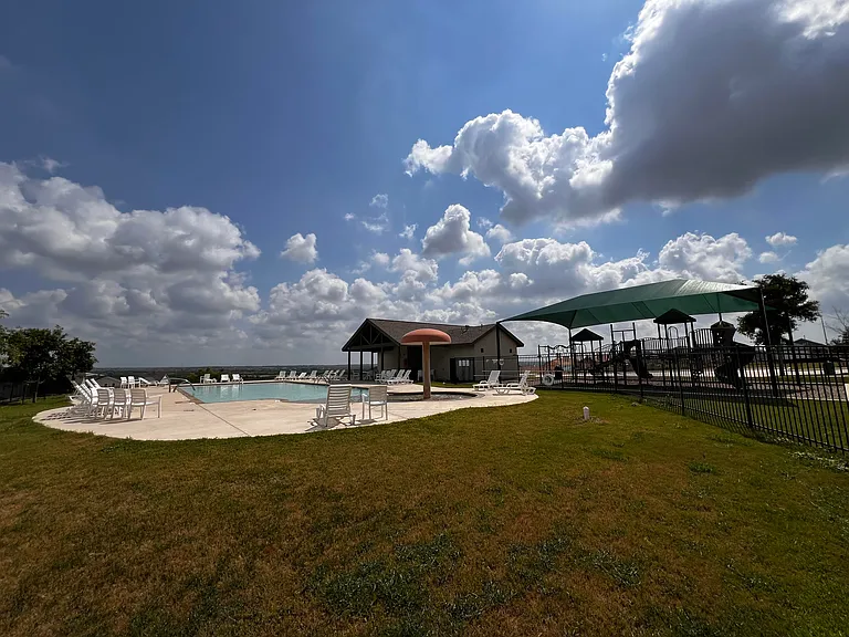 Community pool and playground (2 blocks away from home)