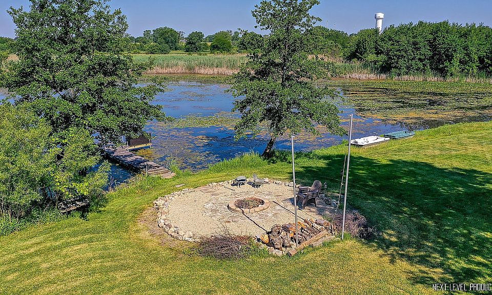 Shared fire pit and dock with one neighbor.