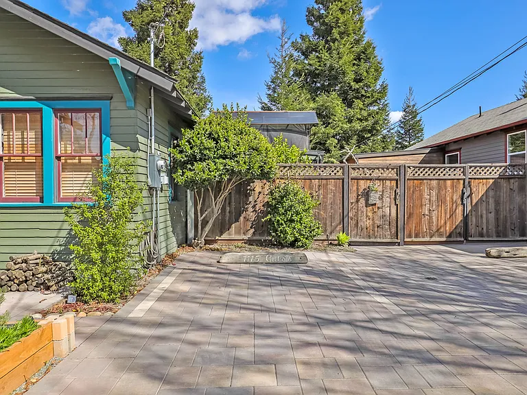 Private off street parking space.

The green house is not the house listed for rent. This listing is for the house in the rear and is not visible from the street view.