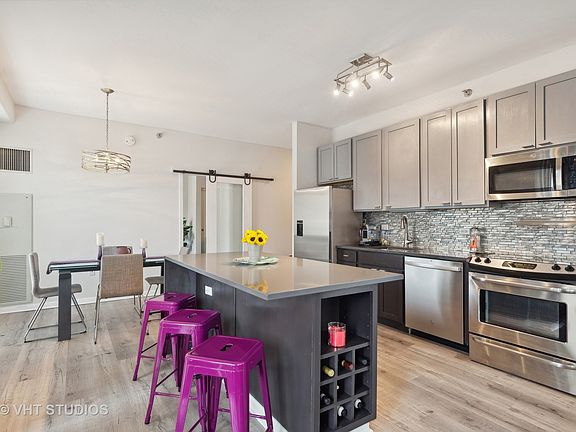 5th image of 1 E 8th St APT 708