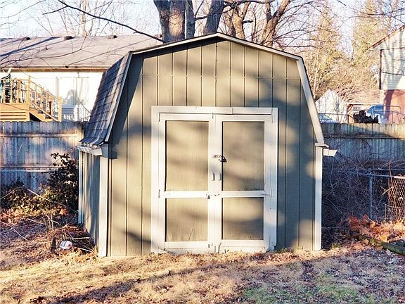 Huge storage shed which even has gutters....