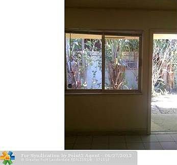2nd image of 611 NE 29th Dr APT 4-A