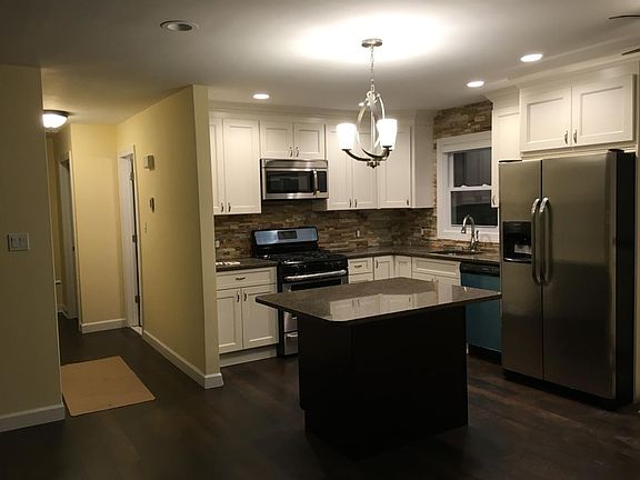 BRAND NEW KITCHEN & WIDE HALLWAY