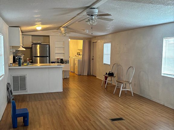 Living room connected to the kitchen.