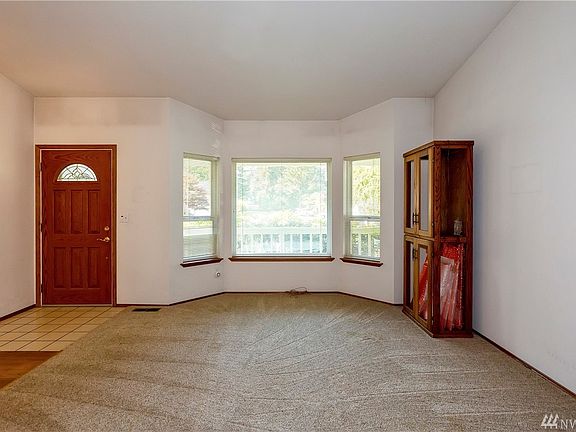 Living room facing front door.