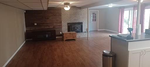 living room with wood burner