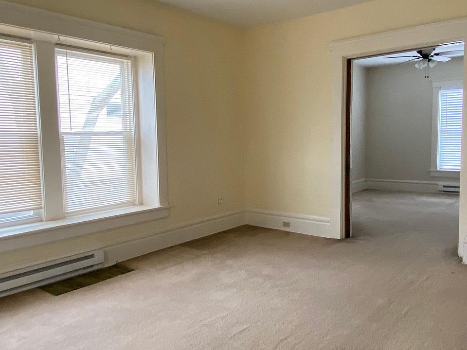 Living room with pocket door to bedroom