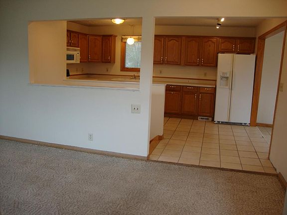 4th image of 5833 Ewing Ave N