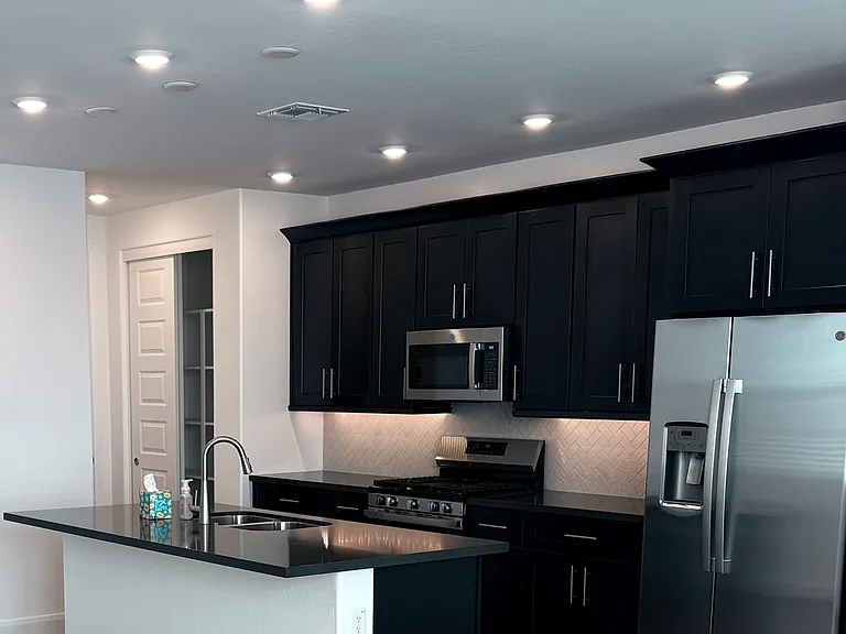 Brand new kitchen, upgraded appliances, under-cabinet and baseboard lighting.