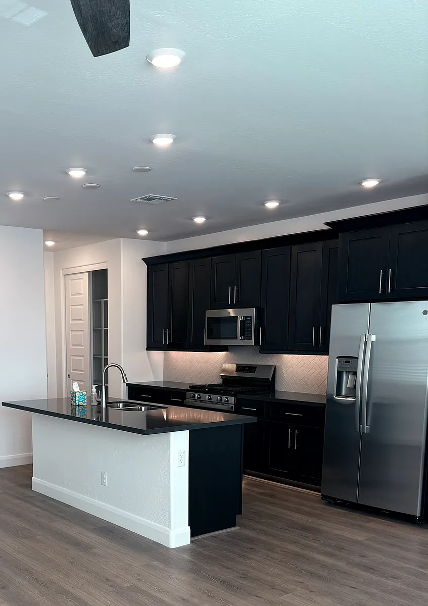 Brand new kitchen, upgraded appliances, under-cabinet and baseboard lighting. - 13975 W Luke Pkwy #109