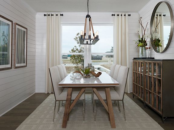 Formal dining area just off the foyer with space to seat the whole family