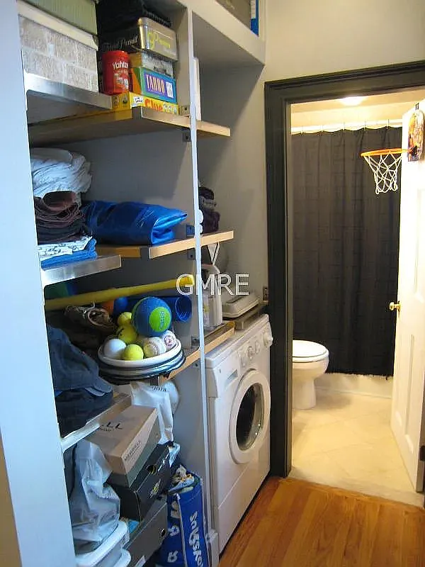 The condo has a washing machine and lots of tuck away storage. - 1 Hull Street Ct #3