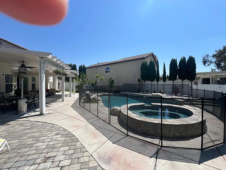 Pool Safety Fence Included (Removable & Stored On-Site)