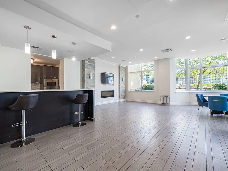 Club room with fridge and built-in speakers for parties, rentable by residents