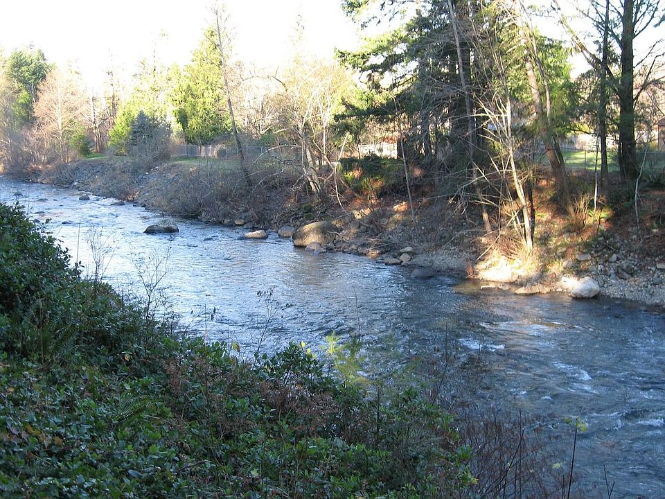 River in the back yard w/ access for the athletic.