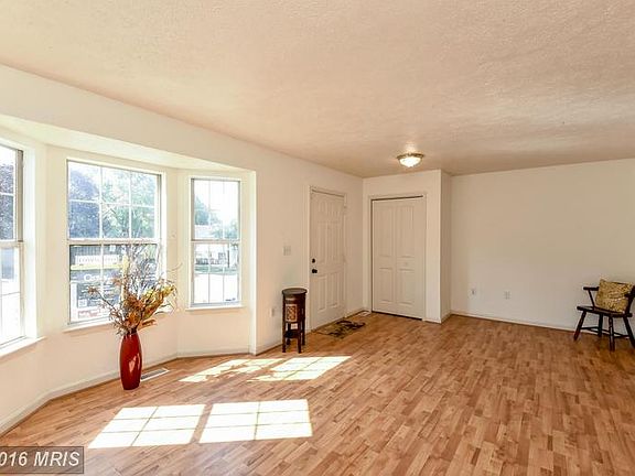 Family Room with lovely bay windows!